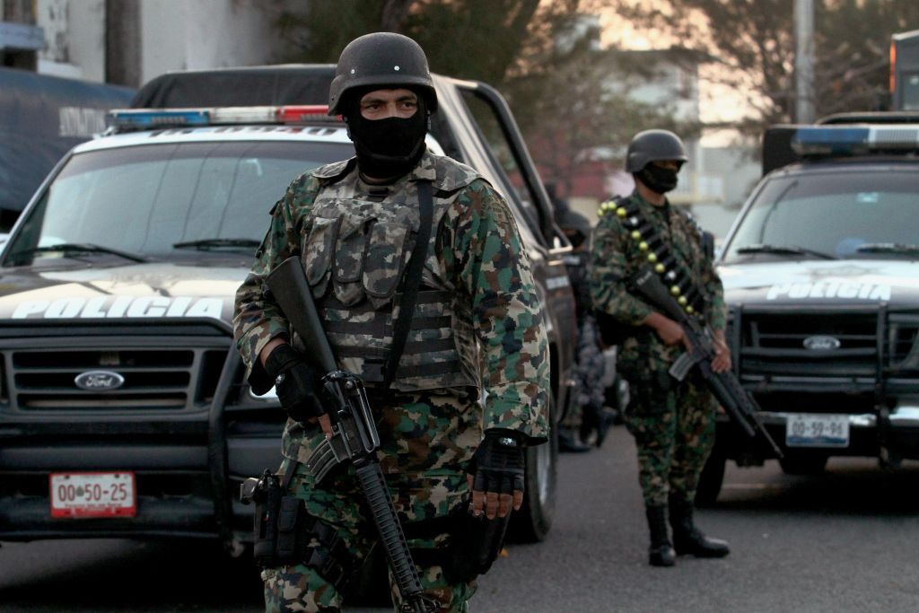 Mexican marines stand guard in front of