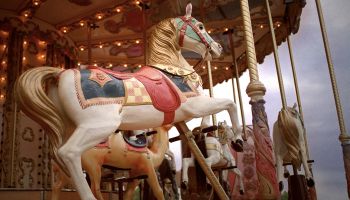 Low angle of a sculpted horse on a carousel in Paris, France