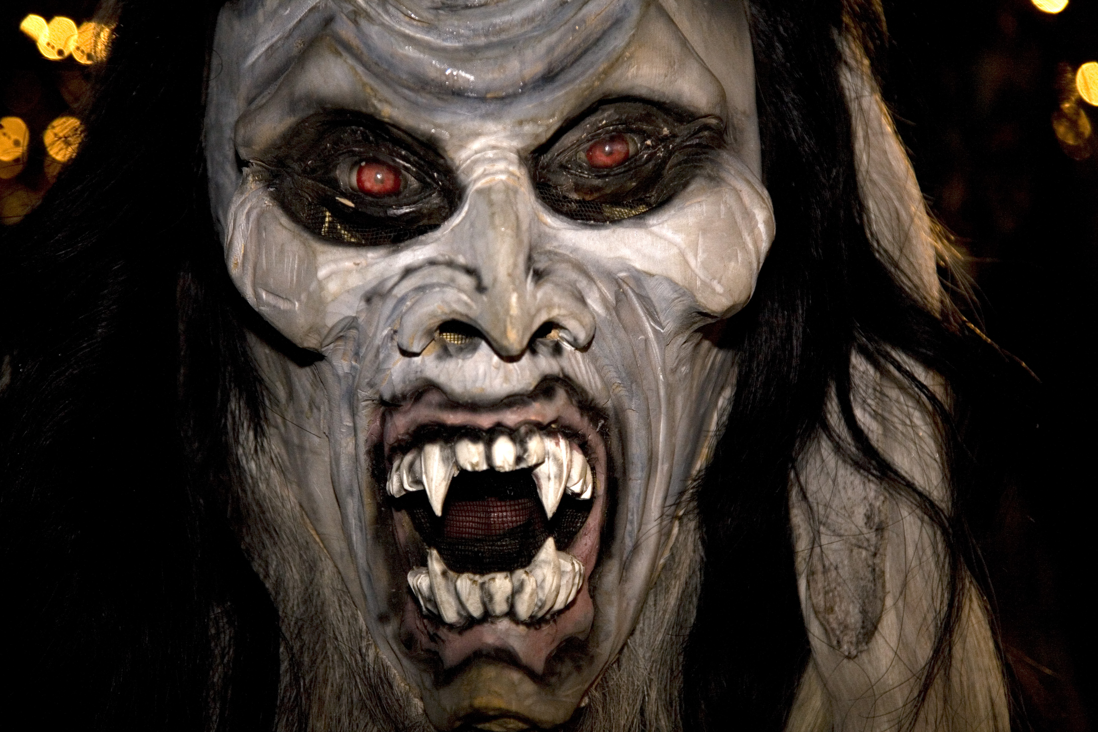 A demonic looking Krampus character on the streets of Salzburg in Austria