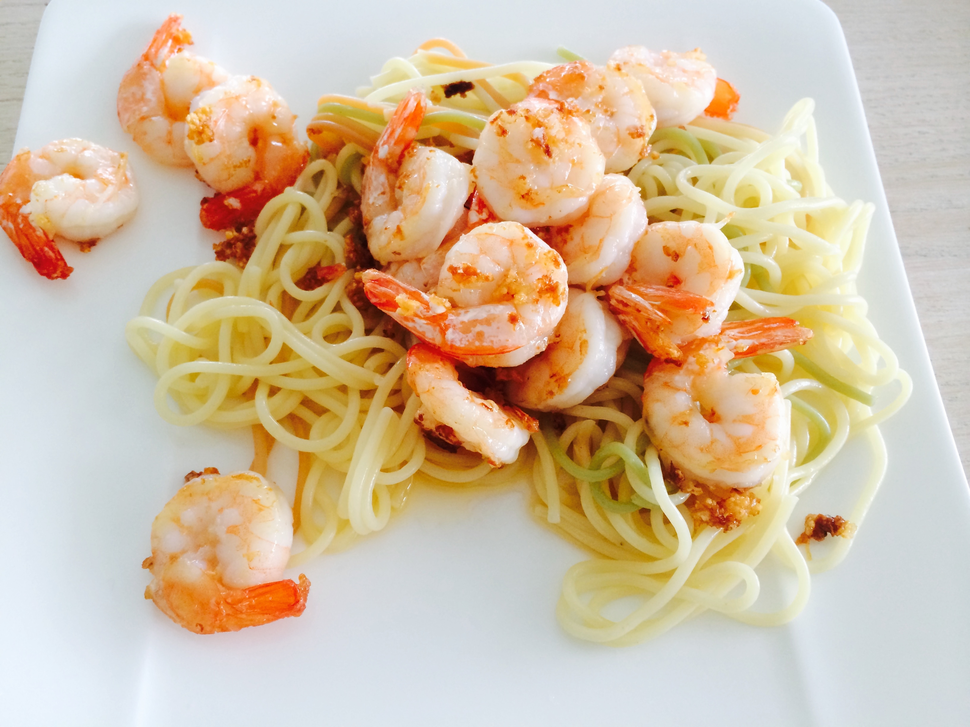 High Angle View Of Pasta With Shrimps Served In Plate