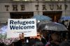 Protestors Rally Against Immigration Ban On Wall Street