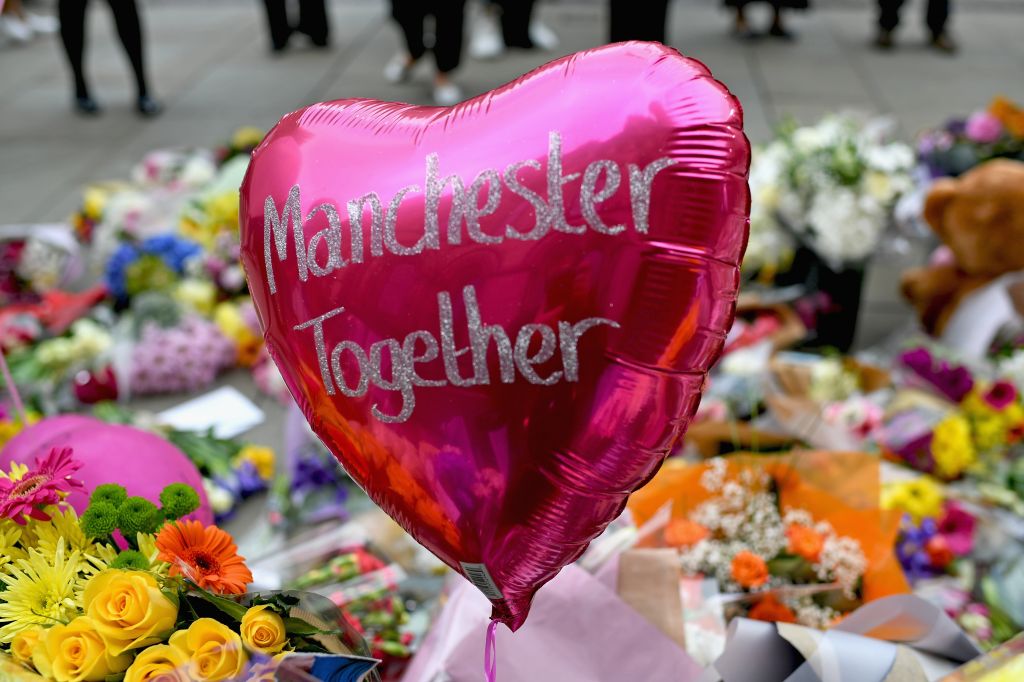Floral Tributes Are Left For The Victims Of The Manchester Arena Terrorist Attack