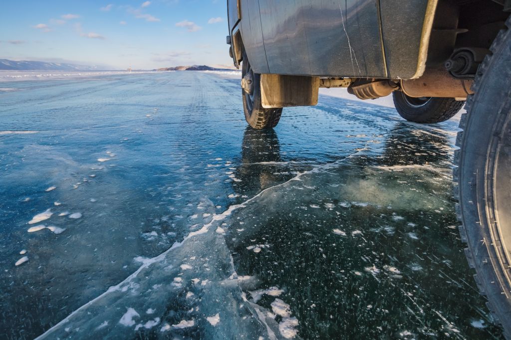 SUV in winter on Lake Baikal
