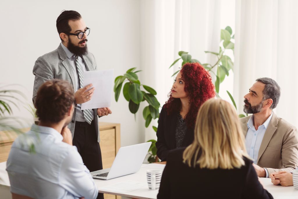 Business People On Meeting In Board Room