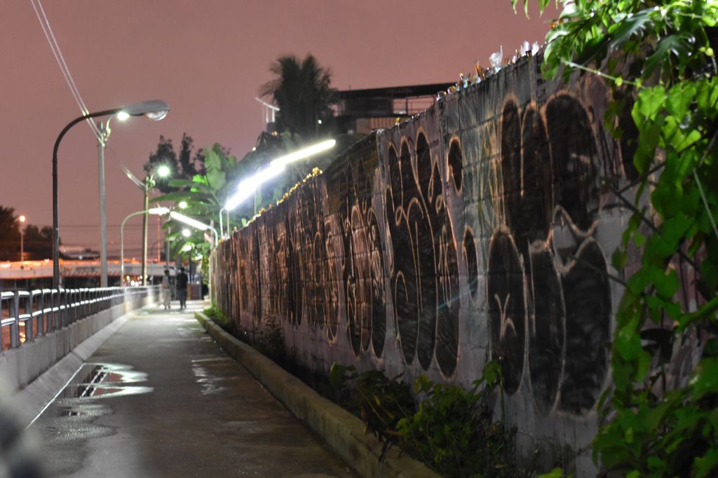 Street Amidst Illuminated City Against Sky At Night