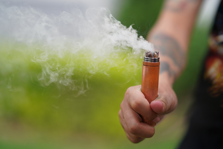 Close up photography hand holding an Electronic Cigarette