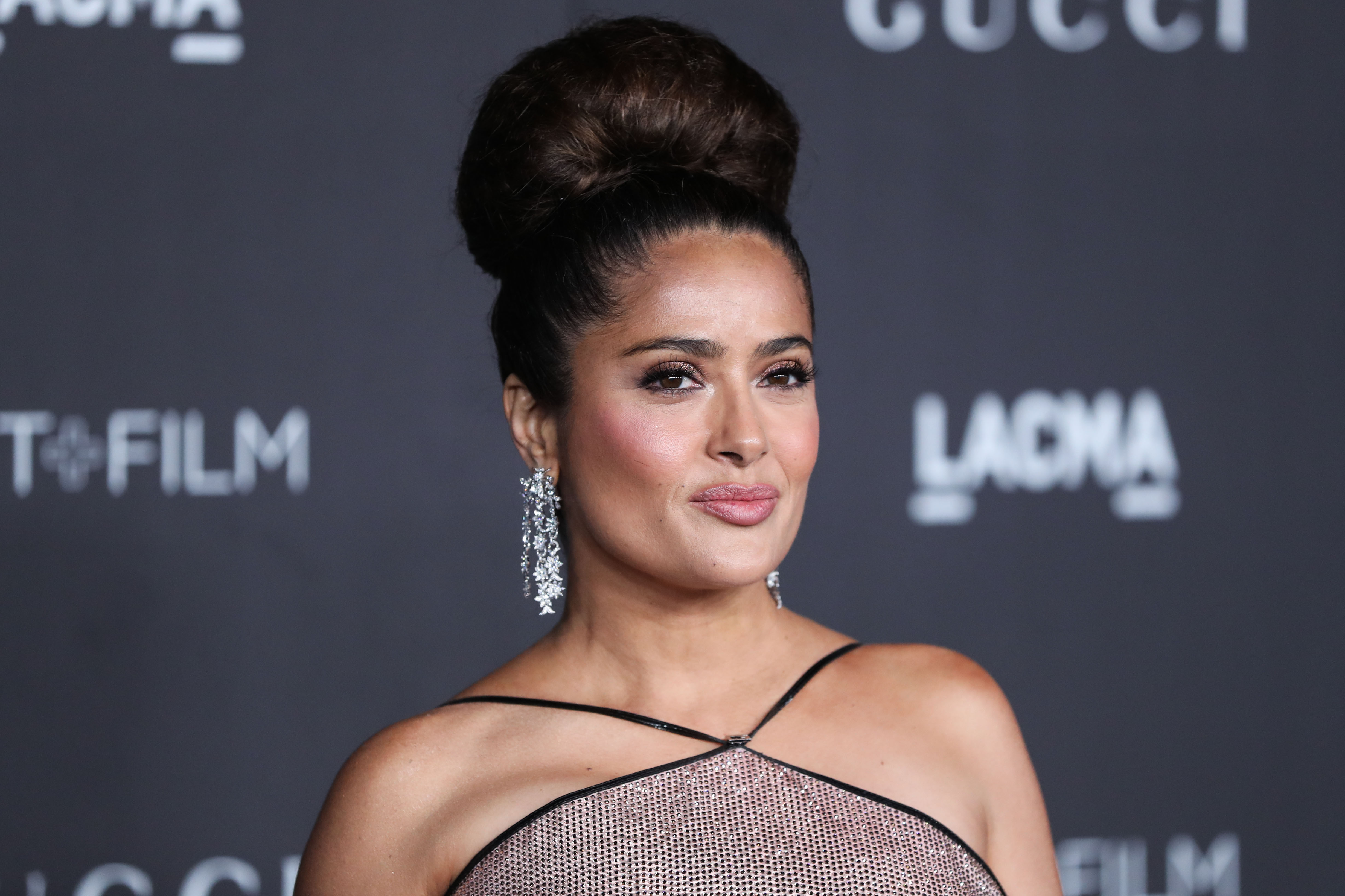 Actress Salma Hayek Pinault wearing Gucci arrives at the 2019 LACMA Art + Film Gala held at the Los Angeles County Museum of Art on November 2, 2019 in Los Angeles, California, United States.