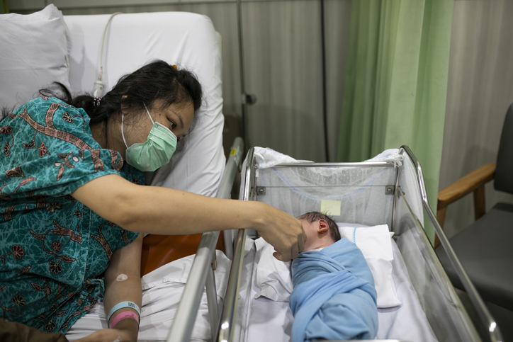 Mother with her newborn baby in the hospital