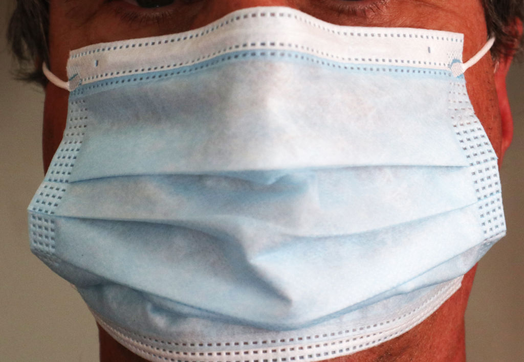 Close-up of photo of person wearing medical mask