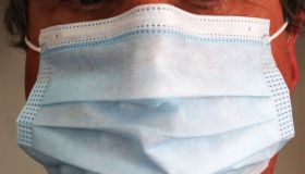 Close-up of photo of person wearing medical mask
