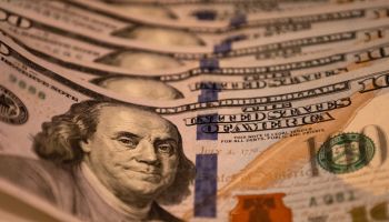 economic stimulus: six crisp $100 bills