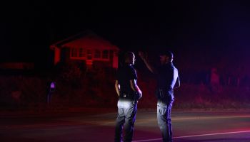 Police work at the scene of a traffic stop