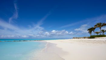 The sands of Grace Bay, the most spectacular beach on Providenciales, Turks and Caicos, in the Caribbean, West Indies, Central America