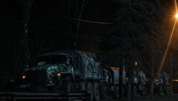 Russian military tanks and armored vehicles advance in Donetsk...