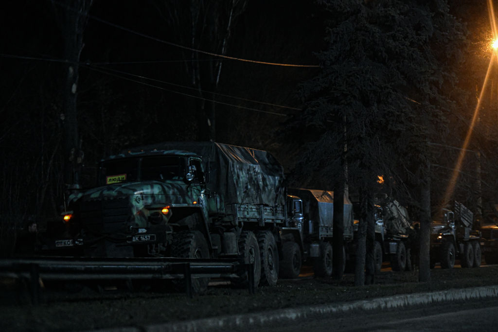Russian military tanks and armored vehicles advance in Donetsk...