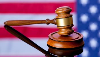 American Justice; Gavel with USA Flag Background