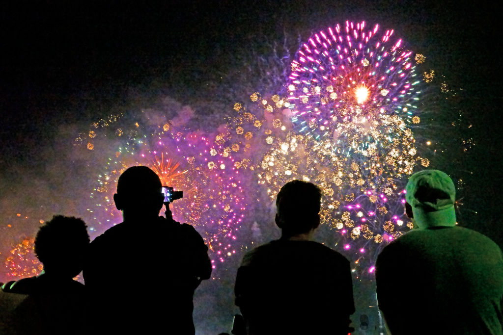 Crowds watching Macy's Fourth of July fireworks display, Manhattan