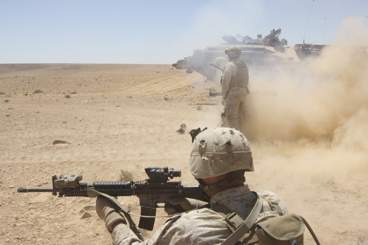 U.S. Marines fire several high-explosive rockets in the Middle East.