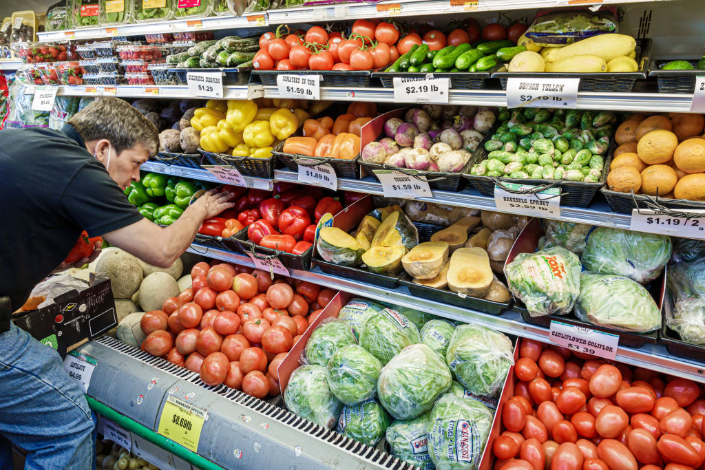 Miami Beach, Florida, Bay Supermarket, stocking clerk in fresh produce aisle