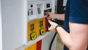 Man Uses Credit Card to Purchase Gas at Pump