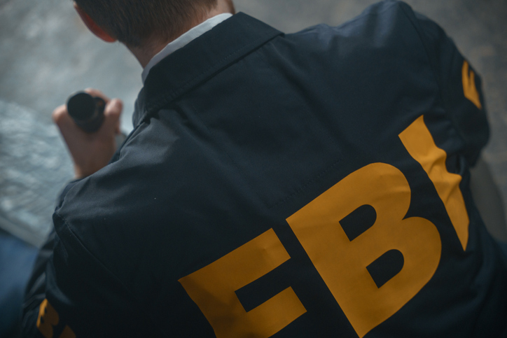 FBI agent's uniform with inscription on a man's back