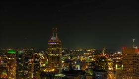 Illuminated Buildings In City At Night