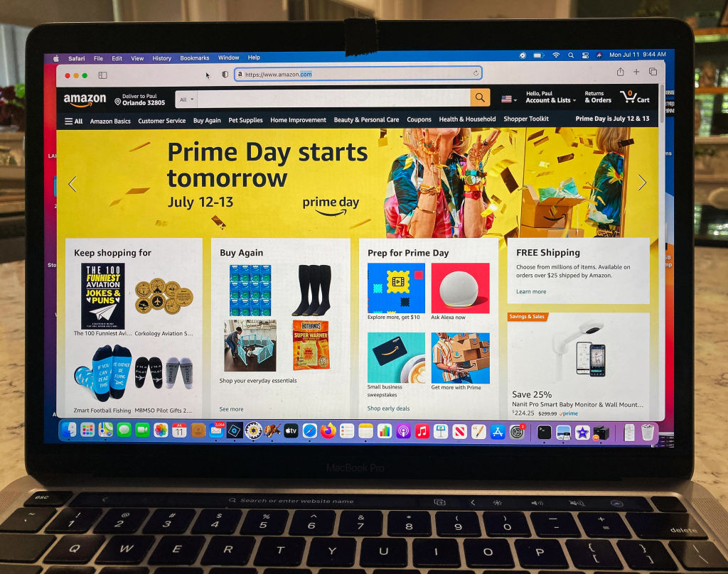 In this photo illustration, the Amazon website is displayed...