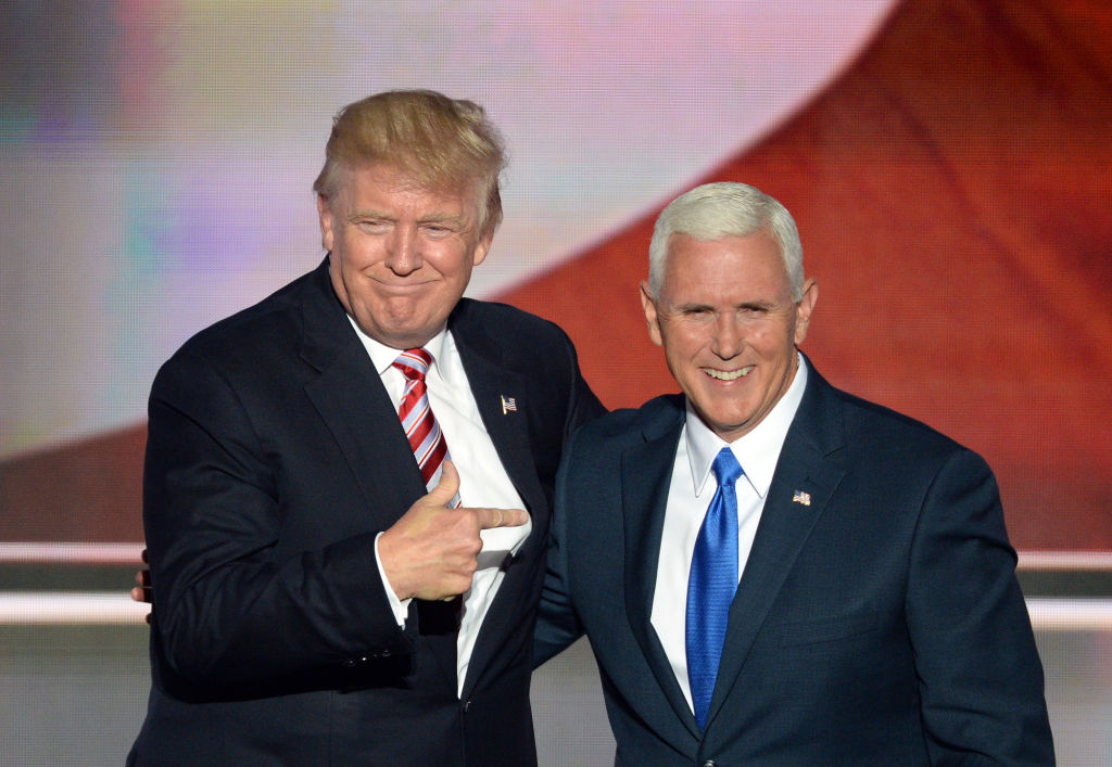 (Cleveland, OH, 07/20/16) Republican presidential candidate Donald Trump, left, joins his running mate, Indiana Governor Mike Pence, on stage during the Republican National Convention at the Quicken Loans Arena in Cleveland, Ohio on Wednesday, July 2