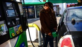 Driver pumps gas for her car at Long Island gas station