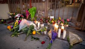 A memorial grows outside the Montery Park Dance Studio Shooting Site