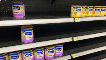 A baby formula display shelf is seen at a Walmart grocery...