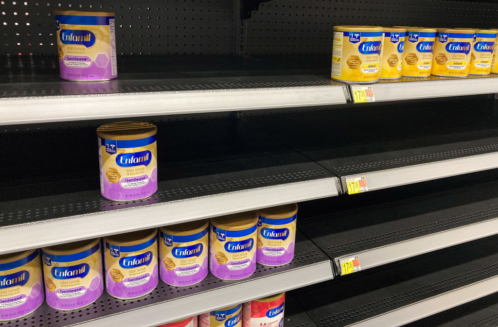 A baby formula display shelf is seen at a Walmart grocery...