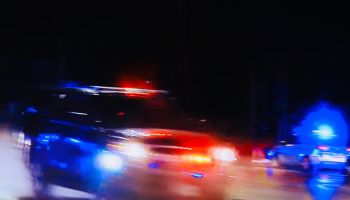 Flashing lights from a high speed police chase