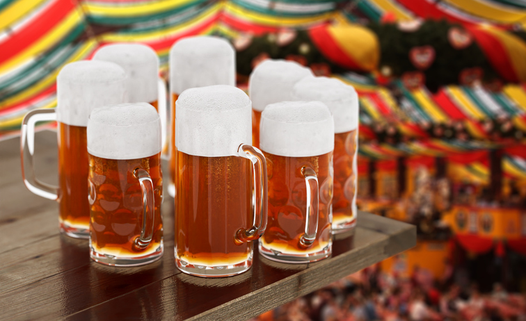 Beer festival set of different beer glasses on a wood table