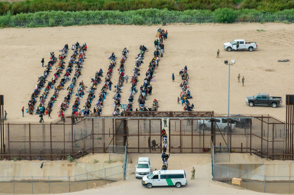 Migrants Wait On Mexican Side Of Border, Hoping For Entry Into United States