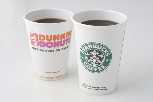 Dunkin' Donuts and Starbucks coffee cups...