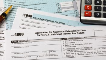 Form 4868 automatic filing extension for federal income taxes. Income tax return filing deadline, delay and penalty concept.