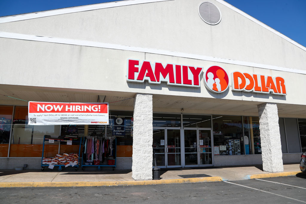 A now hiring sign is seen at the Family Dollar store at the...