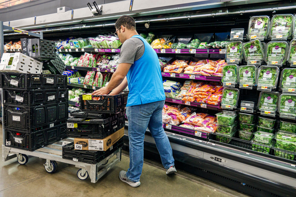 Miami, Florida, Doral, Walmart store, produce greens salads lettuce carrots, associate stock clerk