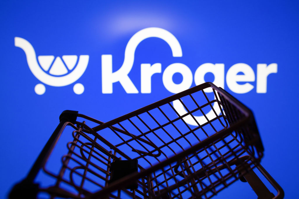 In this photo illustration, the Kroger Company logo seen...