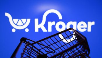 In this photo illustration, the Kroger Company logo seen...