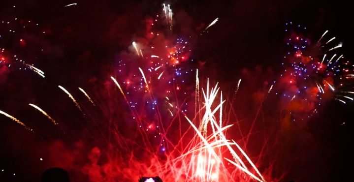 Red Firework celebrate anniversary happy new year 2024, 4th of july holiday festival. red firework in night time celebrate national holiday. Countdown to new year 2025 festival party time event