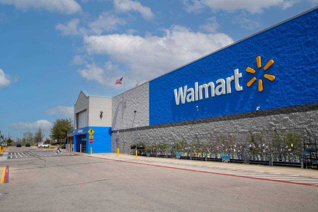 Atchison, Kansas. Walmart store logo with gardening products for sale.