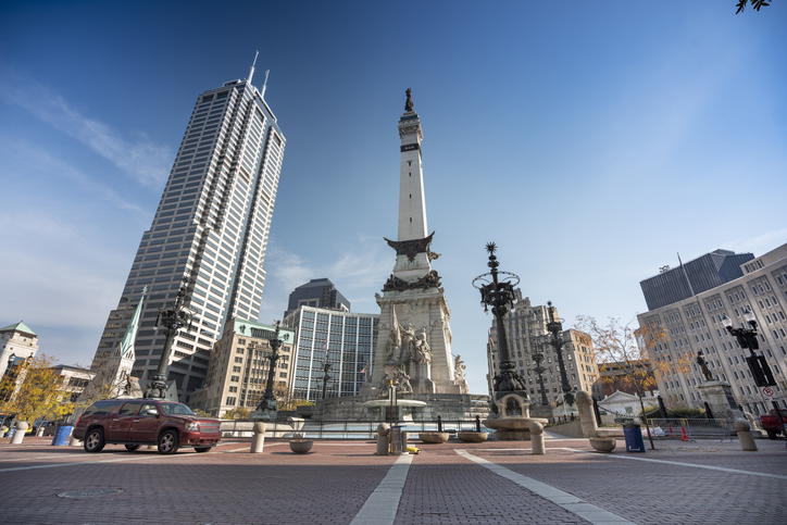 Traffic and people in the downtown city centre of Indianapolis, Indiana USA