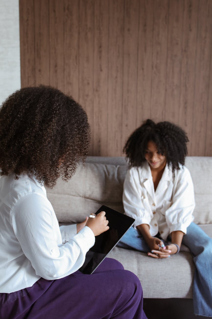 a woman having a therapy session with a psychologist
