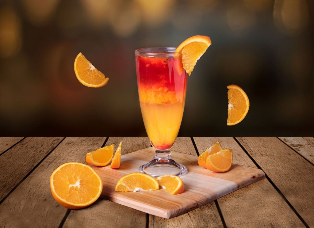 selective focus photo of a drink with orange slices